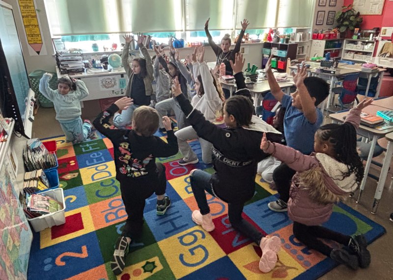 Julie DeLacy gets her students excited to learn more about figure skating.